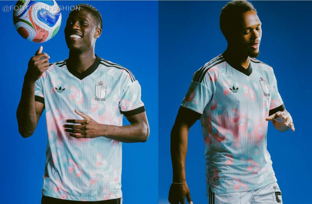 Belgium World Cup 2026 away jersey featuring light blue and pink Magritte-inspired surrealist pattern and adidas Originals branding.