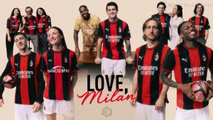 The new PUMA AC Milan 2026/27 jersey showcasing the classic wide red and black stripes on the front and back.