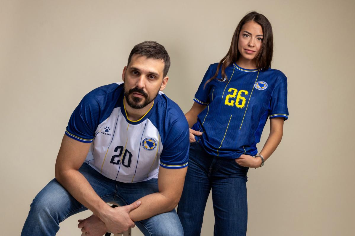 Kelme Bosnia and Herzegovina World Cup 2026 jersey featuring vertical yellow and white pinstripes.