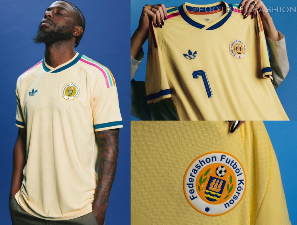 adidas Curaçao World Cup 2026 home and away jerseys, showing the traditional blue kit with wave sleeve graphics alongside the light yellow kit with multicolored stripes.