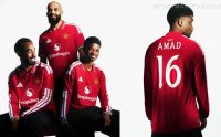 Manchester United 2026/27 jersey featuring a red base with a white polo collar and striped cuffs.