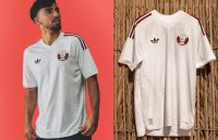 White Qatar World Cup 2026 jersey featuring the maroon adidas Trefoil and QFA crest