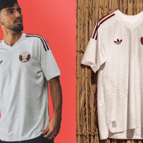 White Qatar World Cup 2026 jersey featuring the maroon adidas Trefoil and QFA crest