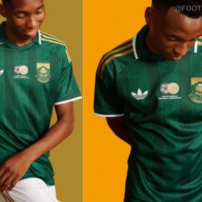Front view of the dark green South Africa 2026 jersey featuring gold shoulder stripes and a polo collar.