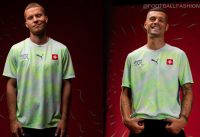 Switzerland 2026 Jersey away kit in Sea Glass and Dark Indigo with topographic pattern and white shorts.