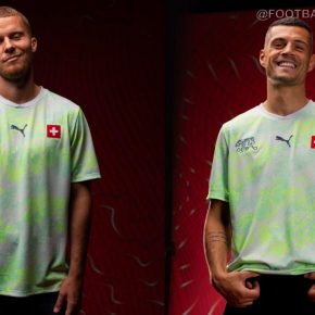 Switzerland 2026 Jersey away kit in Sea Glass and Dark Indigo with topographic pattern and white shorts.