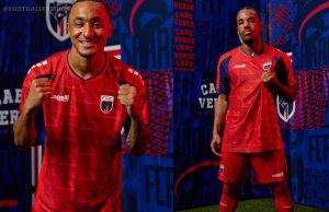 Player wearing the red Cabo Verde 2026 third jersey with a geometric pattern, dark blue sleeve panels, and federation crest.