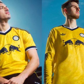 The yellow Leeds United 2026/27 jersey away kit featuring the night navy adidas Trefoil logo and the classic white rose crest.