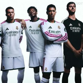 White Real Madrid 2026/27 Jersey featuring dark green collar details and pink adidas shoulder stripes