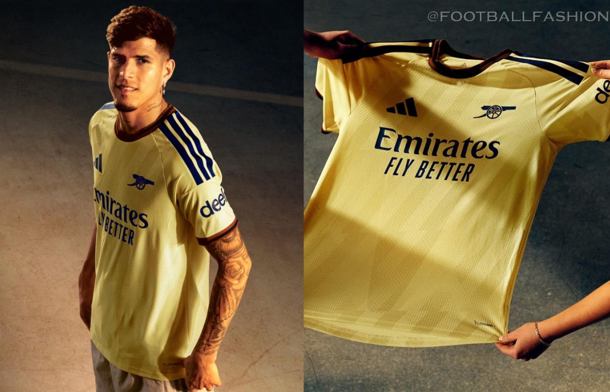 Arsenal Football Club 2026/27 Jersey by adidas featuring a yellow base with engineered lightning graphics and navy cannon crest.
