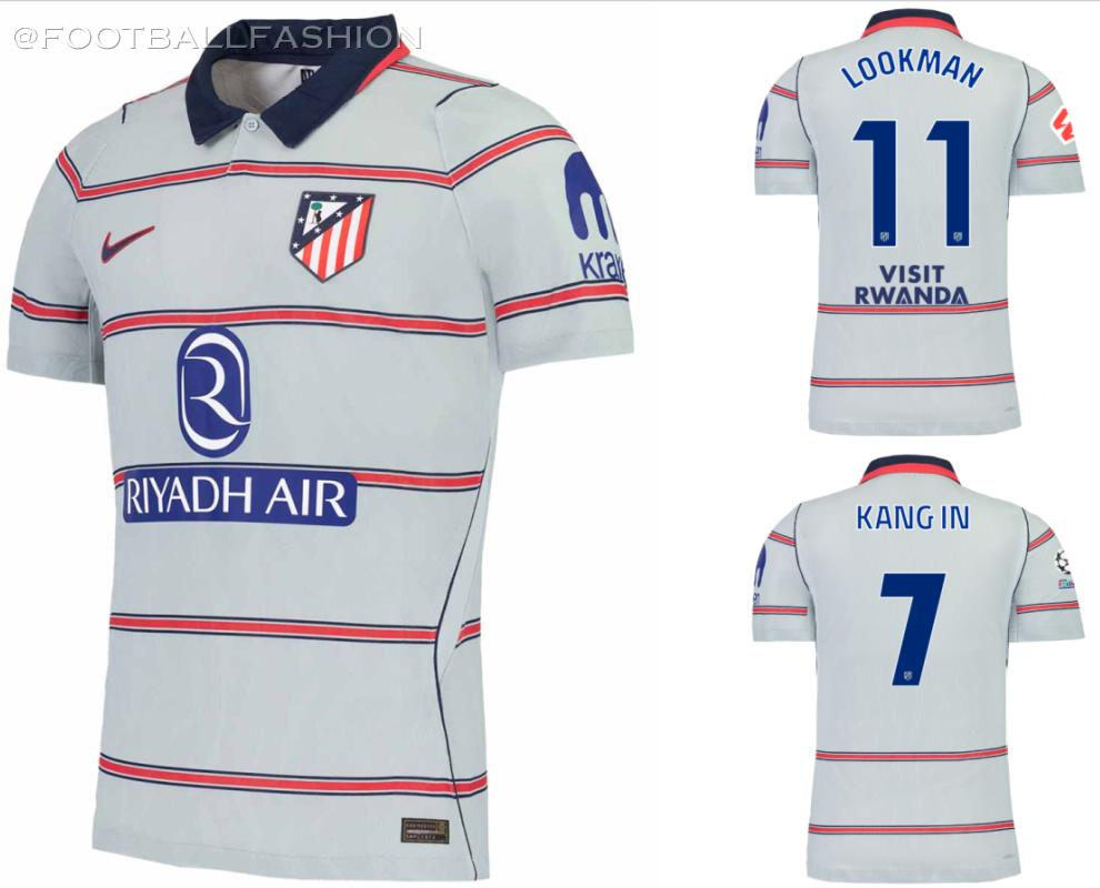 Nike Atlético 2026/27 third kit featuring a grey shirt with six thin red and blue hoops, blue collar, and grey shorts.