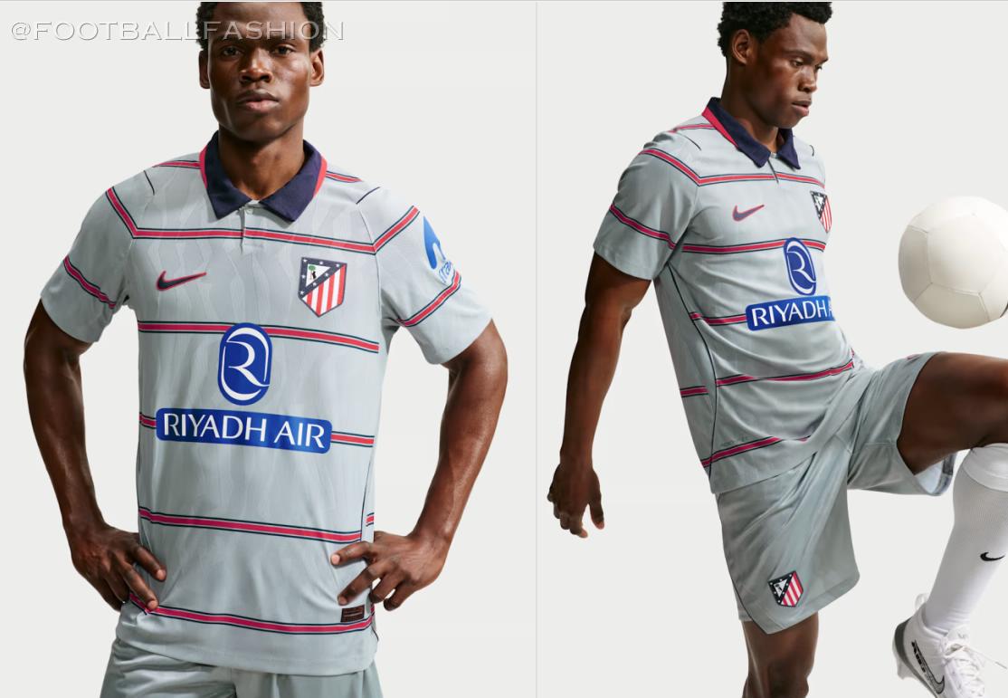 Nike Atlético 2026/27 third kit featuring a grey shirt with six thin red and blue hoops, blue collar, and grey shorts.