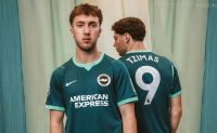 Brighton & Hove Albion 2026/27 Third jersey in deep teal with hyper turq accents and white embroidered Nike swoosh.