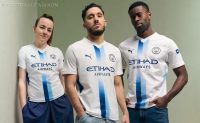 Manchester City 2026/27 kit featuring a central sky blue and navy sash designed by fans using AI.