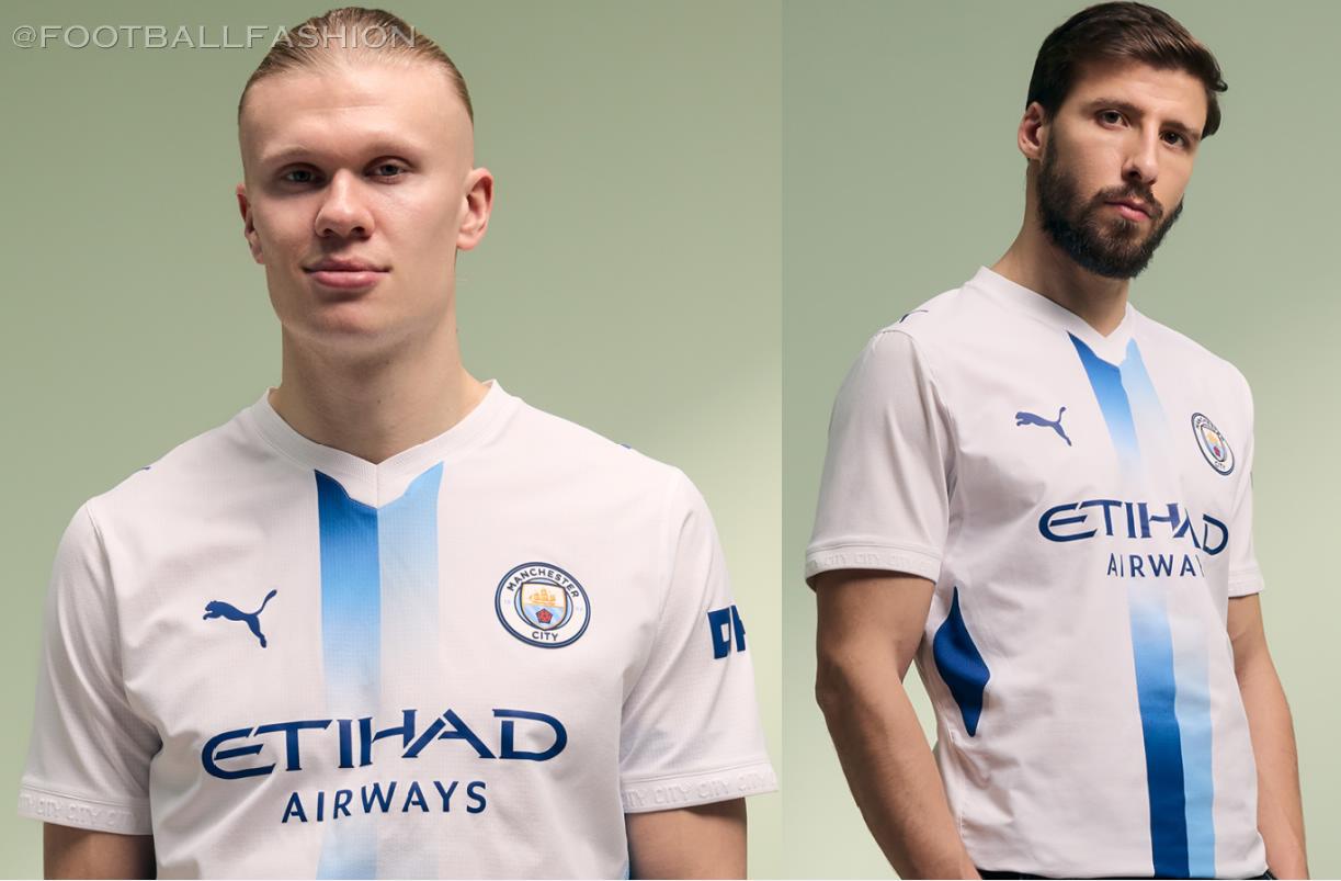Manchester City 2026/27 kit featuring a central sky blue and navy sash designed by fans using AI.