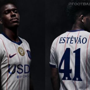 Chelsea FC player modeling the white 2026/27 Nike third jersey with red pinstripes, blue trim, and a retro club crest.