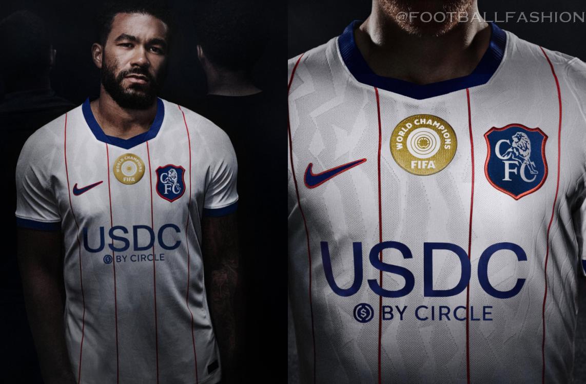 Chelsea FC player modeling the white 2026/27 Nike third jersey with red pinstripes, blue trim, and a retro club crest.