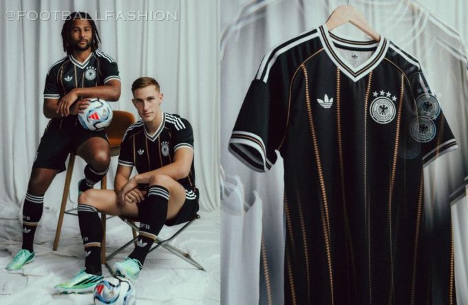 The black Germany 2026 Jersey featuring vertical gold diamond lines, white Trefoil logo, and four-star DFB badge.
