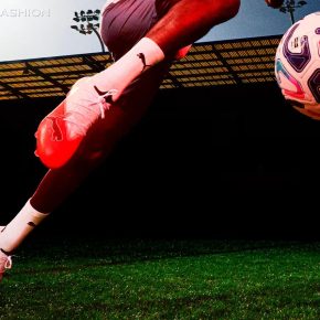 PUMA ULTRA NITRO 7 firm ground soccer boots resting on a natural grass pitch