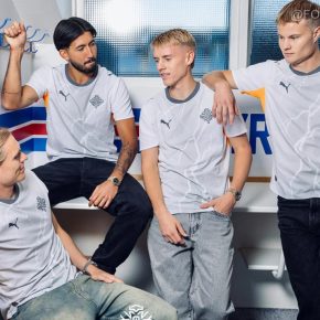 White and grey Iceland 2026/27 away jersey by PUMA featuring volcanic rock patterns and orange accents