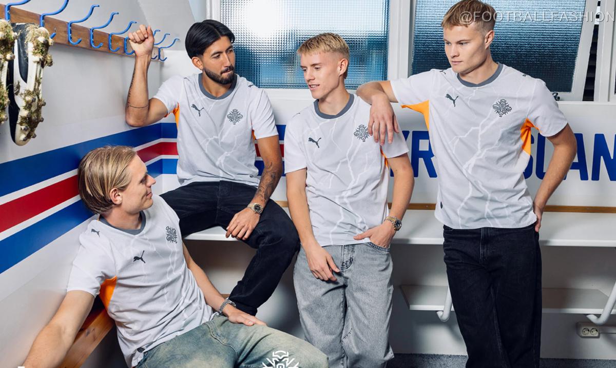 White and grey Iceland 2026/27 away jersey by PUMA featuring volcanic rock patterns and orange accents